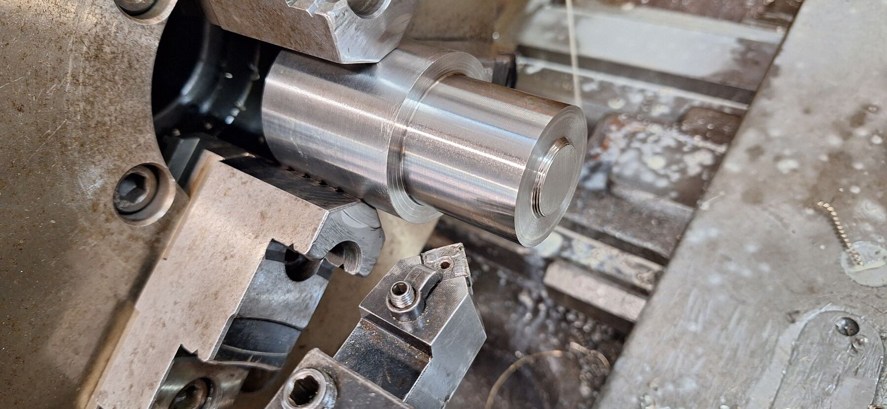 Center caps being machined in the Mako shop